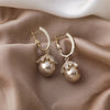 Boucles d'oreilles Malia en forme de goutte avec perle